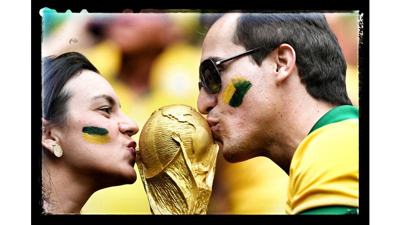 7/42 Brazil fans kiss the World Cup, Brazilia, Brazil 2014